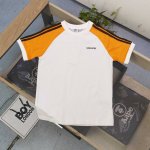 上新 款号：Zz6511 2025新款Adidas阿迪达斯三叶草刺绣Logo拼接女款短袖T恤，三条纹经典装饰，碰撞出独特的运动潮流感。胸前标志性三叶草 Logo