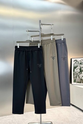 prad*普拉-达25S新款休闲裤.低调穿着搭配！松紧腰抽绳.两侧插袋，口袋下方品牌字母立体硅胶设计.后兜原版经典三角皮标设计.基础款设计.合体的立体剪裁.中线
