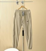 清薄透气 后腿处激光冲孔透气清凉 钩子耐克Nike Nk男款夏季弯刀版型轻薄拼接休闲裤 尺码:M,L,Xl,2Xl,3Xl 黑色,卡其,军绿 四面弹户外速干面料