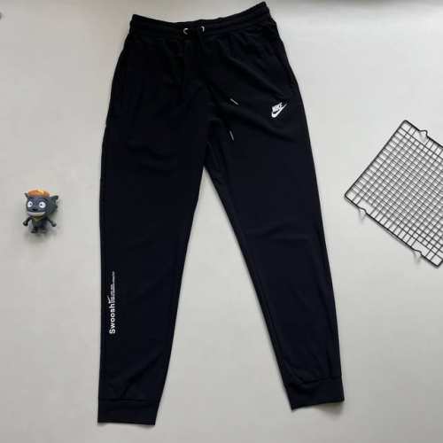 耐克Nike25Ss夏季新款速干运动裤！ 采用180克重冰丝速干面料，上身清凉，透气性好，垂感好，上身效果佳！ 经典硅胶Logo印花，高品质，运动时尚首选！三标