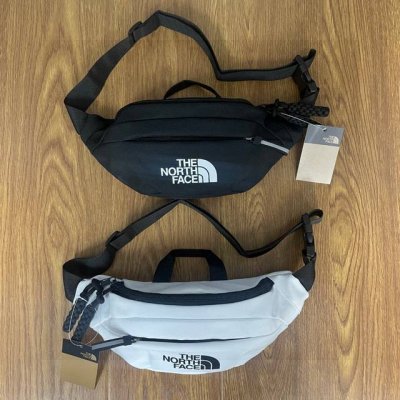 The North Face Tnf北面反光条单肩包多功能运动休闲腰包胸包手提包斜挎包包 材质：帆布 肩带：110Cm 可调节 颜色：黑色 白色 尺寸：33X