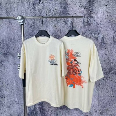 1087 挂拍 北面 The North Face 太阳花大树Logo拼接印花短袖T恤情侣款 简洁圆领灵活舒适易穿搭 概念性品牌印花潮流时尚有新意 棉质面料柔软