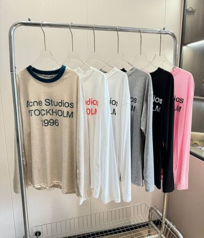 品名：Acn* Studios新款做旧字母丝薄长袖T恤 尺码：M.L 颜色：白色黑字 白色红字 燕麦 灰色 黑色 粉色 手感是非常丝滑冰凉的，面料韧性很大，巨透