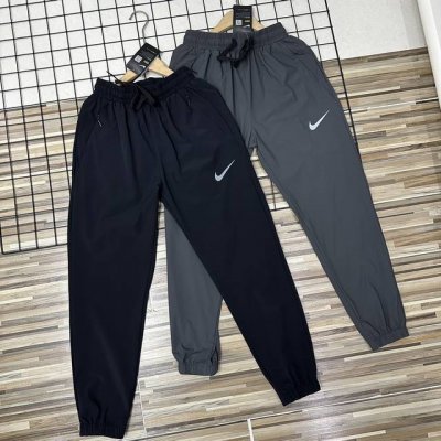 耐克牛奶般丝滑！3M反光Logo简约风透气眼设计！立体裁剪耐克Nike25春夏男女同款情侣款高逼格男士松紧腰带抽绳设计休闲裤运动裤薄款清凉夏季速干裤长裤子！ 丝