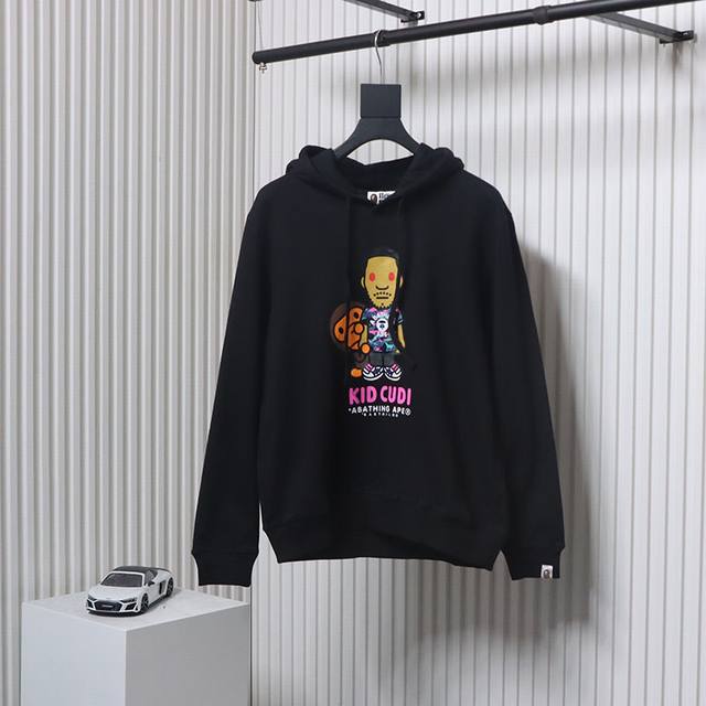 p190 Bape联名Kid Cudi卡通人物帽衫（特价） bape联名Kid Cudi卡通人物帽衫 Bape联名Kid Cudi系列，前面简单印花人像设计，后