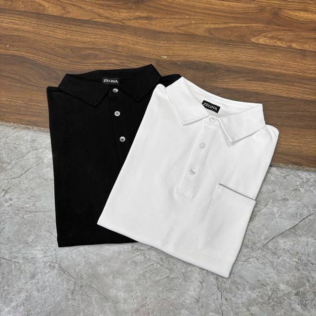 p250 New# zegna 杰尼亚 臻品定制系列的设计Polo衫确实独具匠心，展现了定制服装的精致与品味。这款Polo衫采用进口丝光珠地网眼棉材质，不仅触感