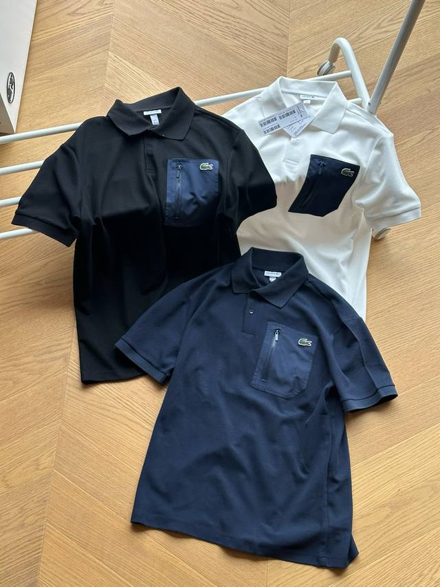 供 Lacoste法国鳄鱼 拉链口袋 翻领休闲短袖Polo衫 黑色 白色 藏青 3～6码 相当于S~Xl 原版100% Polo网眼棉，亲肤舒适，胸口拉链口袋设