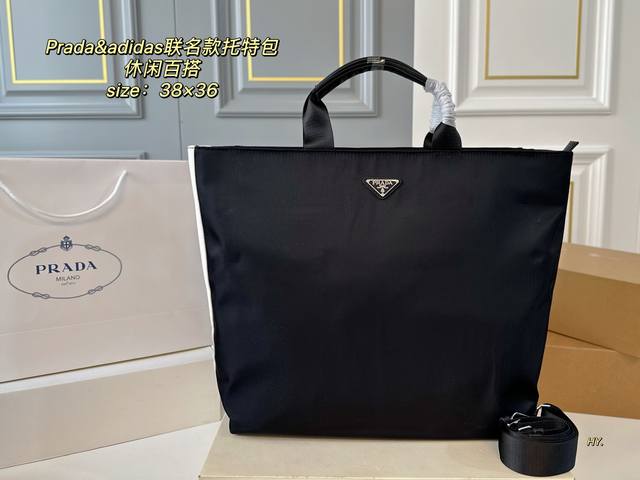 无盒 Size：38×36 Prada普拉达新款Adidas 联名走秀款托特包 进口尼龙面料，超厚实，耐磨耐造 配有长肩带，可手提可斜挎～ 拉链开合，空间变大，