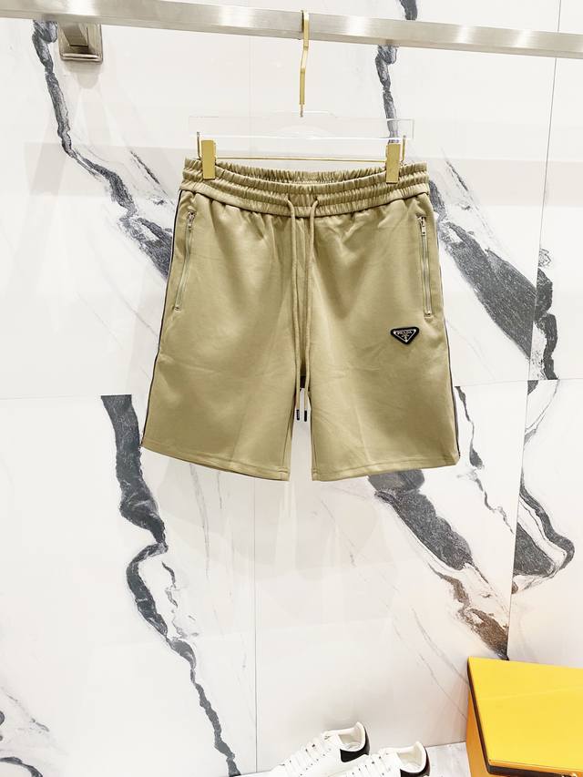 Prada 普拉达 定制太空棉短裤 提花字母织带Logo三角标口袋拉链设计 官方同步 高版本 高品质 时尚个性 百搭潮流 纯原品质 原版面料 吊牌 领标 水洗麦