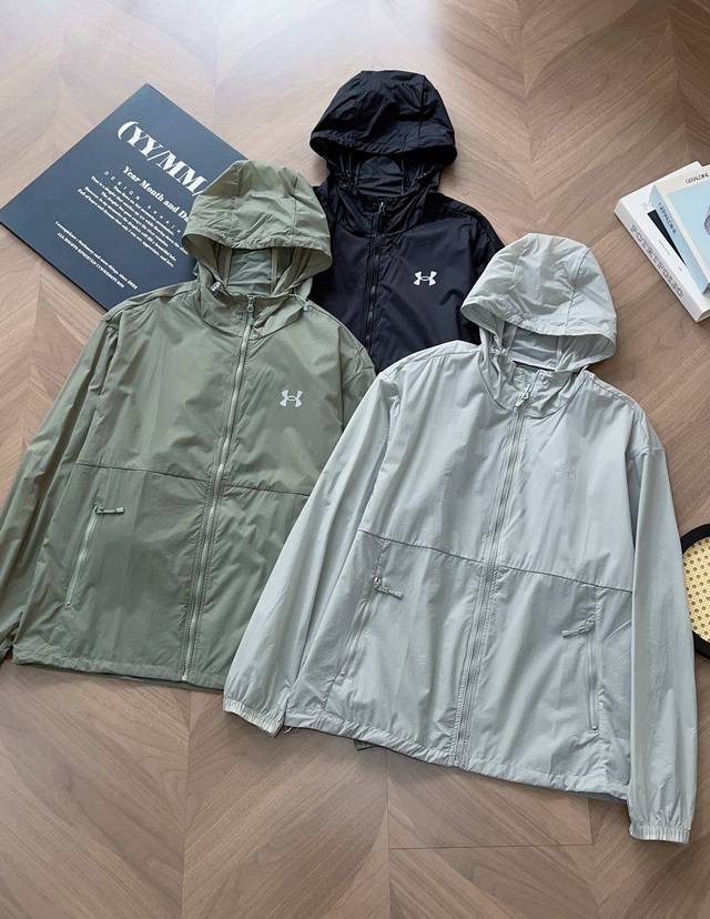 9918# Ua 安德玛新款春款户外冲锋衣外套25Ss新品 连帽可拆卸防风水透气轻量冲锋衣 男女同款 高品质 防风防水 ，轻量化设计 ，宽松大牌设计 立体剪裁