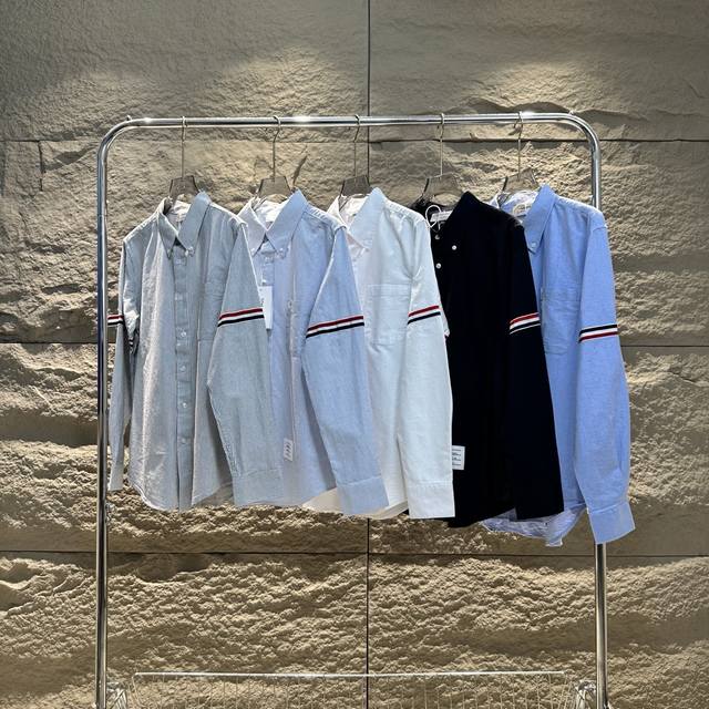 Thom Browne 2025春夏男女舒适时尚百搭长袖衬衫 经典永不过时 一件汤姆布朗的衬衣，品味的象征。简约的设计，精致的剪裁，无论正式场合还是日常穿搭，都