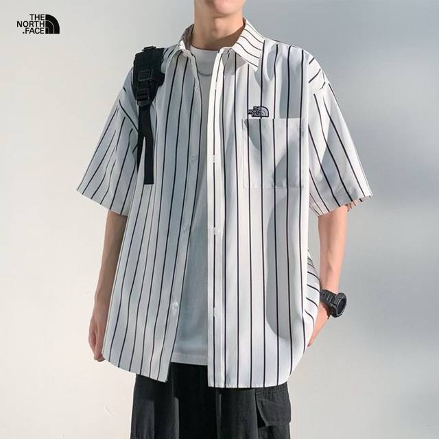 上新发 Tnf北面海外版25Ss新款三色Ins重工水洗条纹工装短袖衬衫 Ins超火三色可选 四季穿搭不二之选 上身超酷. 整衣采用水洗格子设计 经久耐看 高品质