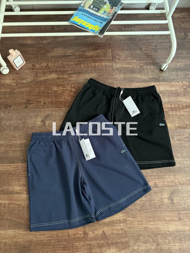 颜色：黑色 藏青 尺码：M到Xxl Lacoste法国鳄鱼男装25春夏新款时尚休闲纯棉运动五分卫裤 Gh2221 线上890 25年柜子新款！明线设计鳄鱼刺绣毛