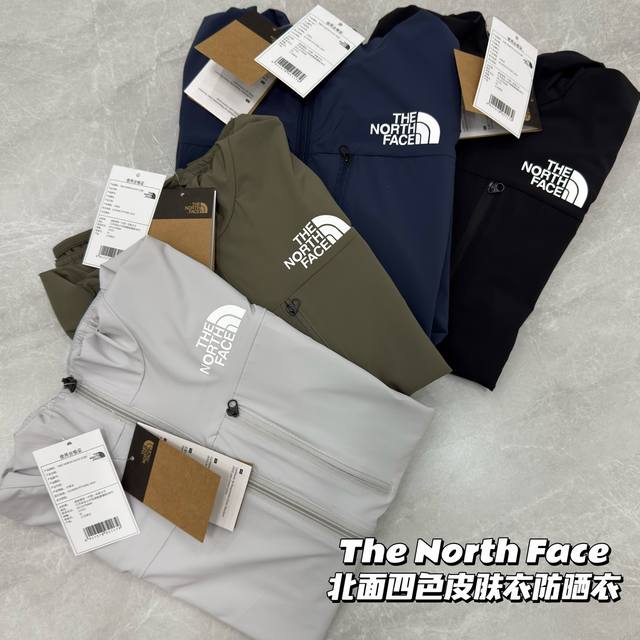 The North Face北面四色爆款连帽防晒衣皮肤衣 专柜同款四面弹皮肤衣男女同款 采用经典Upf四十 面料制成的运动连帽上衣。面料顺滑挺阔，横条肌理感，