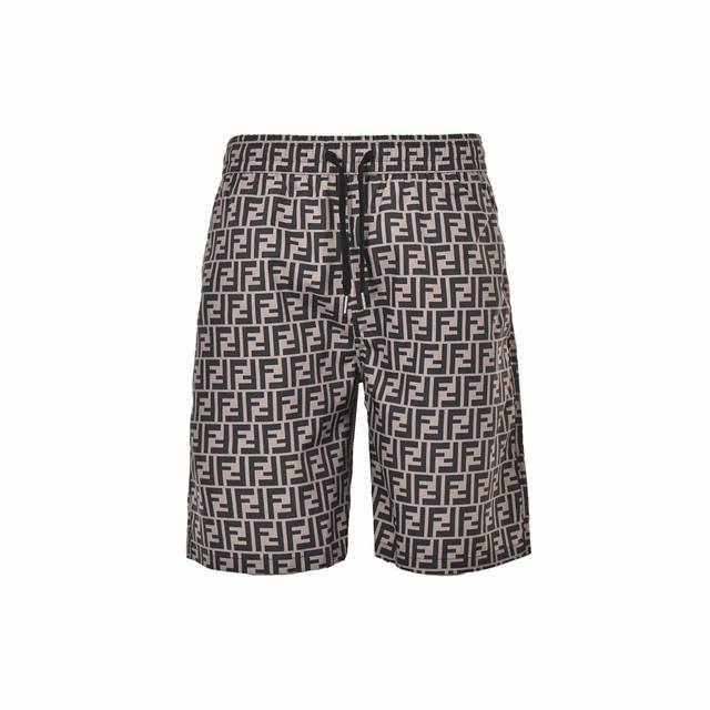 Fendi 芬迪 经典Ff满印尼龙短裤 夏季渠道限定沙滩短裤，定制满印老花面料作为整条裤子的点睛之笔，更具个性高级， 宽松的阔腿裤版型，上身秒变大长腿， 手感柔