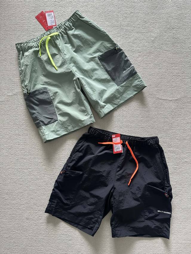 日单情侣款 户外短裤 现货Helly Hansen 防撕裂尼龙水陆两栖户外运动休闲短裤 面料带有涂层 防水 宝贝详情 由防撕裂材料制成的两栖短裤，适合在水边活动