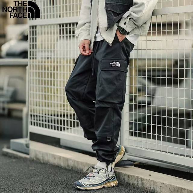 北面The North Face春季新款，男士松紧腰抽绳显瘦百搭侧边双口袋户外工装裤，男士冲锋裤，百搭工装休闲裤！ 颜色:军绿色，黑色，卡其色 尺码:M-3Xl