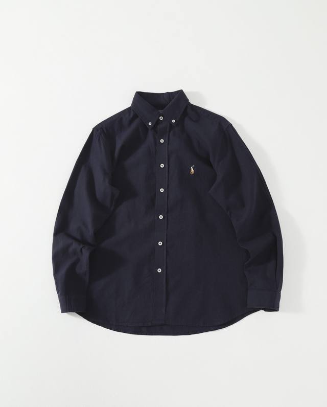 拉夫劳伦Polo Ralph Lauren Ss25 格纹小马Logo刺绣牛津纺长袖衬衫 牛津纺衬衫特点是 %棉，经过成衣染色和水洗处理，具有复古外观和质感。这