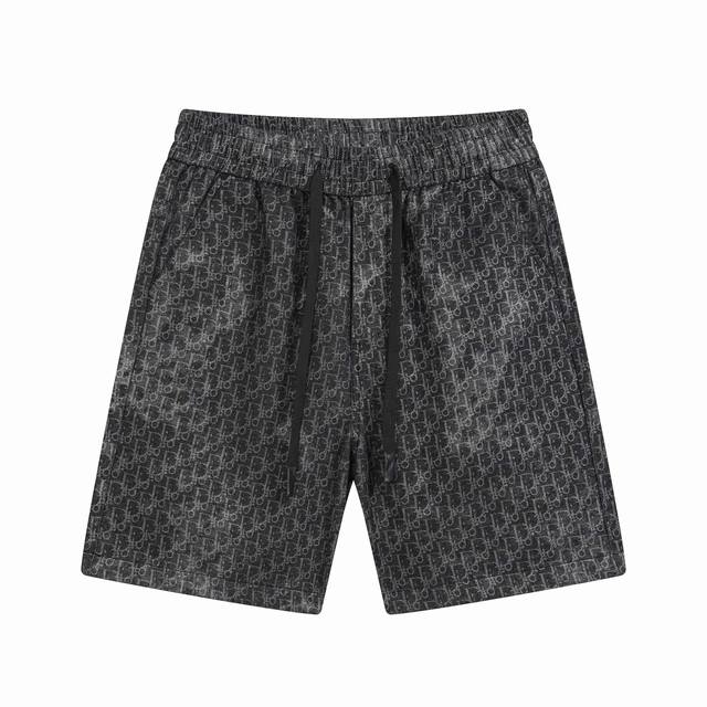 dior 迪奥 25Ss 满印不规则烫银牛仔短裤 这款短裤从日本古老纺织工艺汲取灵感 重新诠释标志性的 Oblique 印花 采用海军蓝色和黑色棉质牛仔布精心制