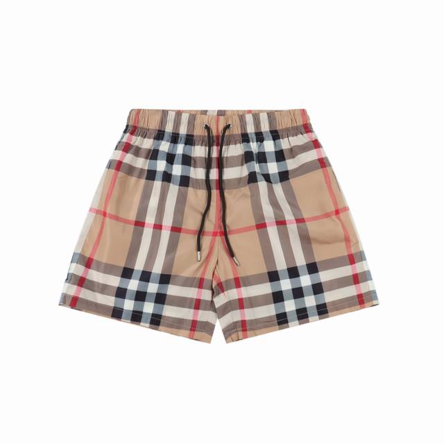burberry 巴宝莉 条纹格子沙滩短裤 夏季渠道限定沙滩短裤，定制条纹面料作为整条裤子的点睛之笔，更具个性高级，宽松的阔腿裤版型，上身秒变大长腿，手感柔软细
