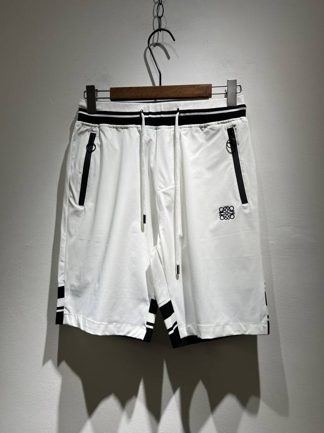 loe*We罗*威 2025春夏新款男女同款休闲短裤，意大利原厂订单渠道，极具个性高级风，标志Logo刺绣工艺设计！宽松阔版型打造，情侣款纯棉休闲短裤！！定制原