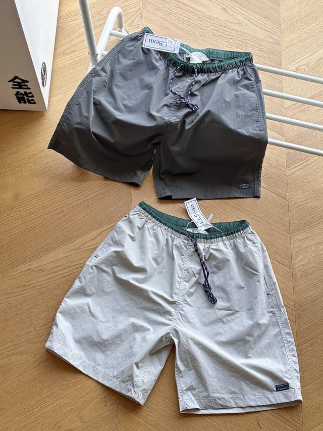 供 L.L.Bean 25Ss Milo pull 日系防水尼龙休闲宽松短裤 白灰色 深灰色 s~Xl 拼接配色腰带,高密度尼龙塔夫绸 其特点是具有恰到好处的弹