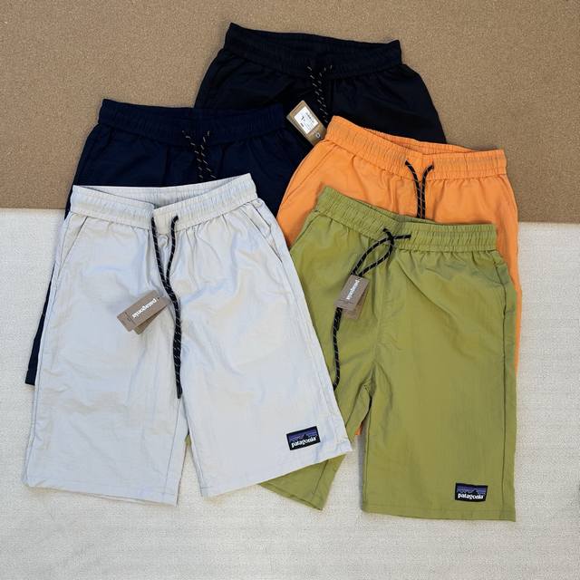 patagonia 巴塔哥尼亚 24Ss夏季休闲日系纯色工装休闲短裤 颜色 黑色 藏青色 橙色 绿色 米白色 尺码 M-3Xl patagonia是美国户外零售