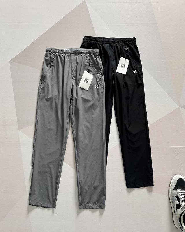 kolon Sport 可隆长裤休闲裤 kolon Sport 可隆 2025年夏季两色户外男士速干挺阔版型梭织运动长裤 户外速干机能裤户外登山徒步休闲长裤胶印