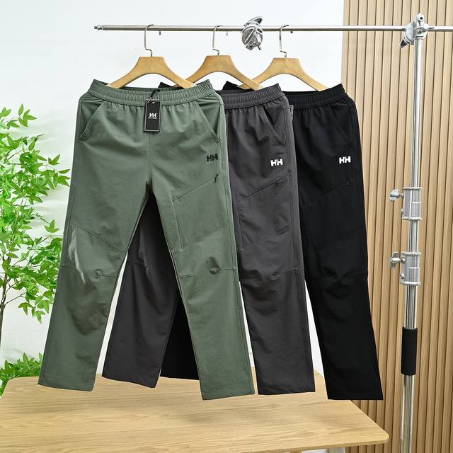 上新 款号 862316# helly Hansen 海丽汉森2025年春季新款户外运动休闲冲锋长裤 常牛的一休款闲裤 纯色锦纶面料裤子种各细看节图 上手的觉感