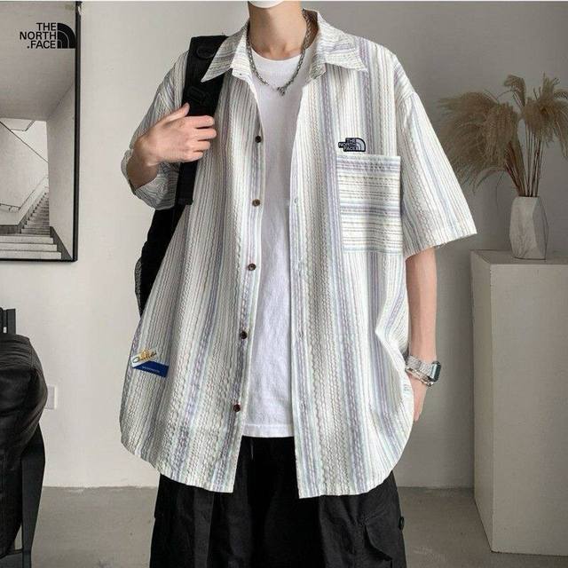 tnf北面海外版25Ss新款三色重工水洗条纹工装短袖衬衫 ins超火三色可选 四季穿搭不二之选 上身超酷. 整衣采用水洗牛仔设计 经久耐看 高品质高质量. 水洗