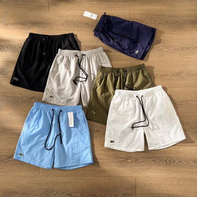 供 Lacoste法鳄 小鱼刺绣Logo松紧腰抽绳 速干短裤沙滩裤 黑色 白色 藏青 灰色 绿色 蓝色 s~Xl 3-6码 代购原版开发 速干梭织面料 基础小鱼