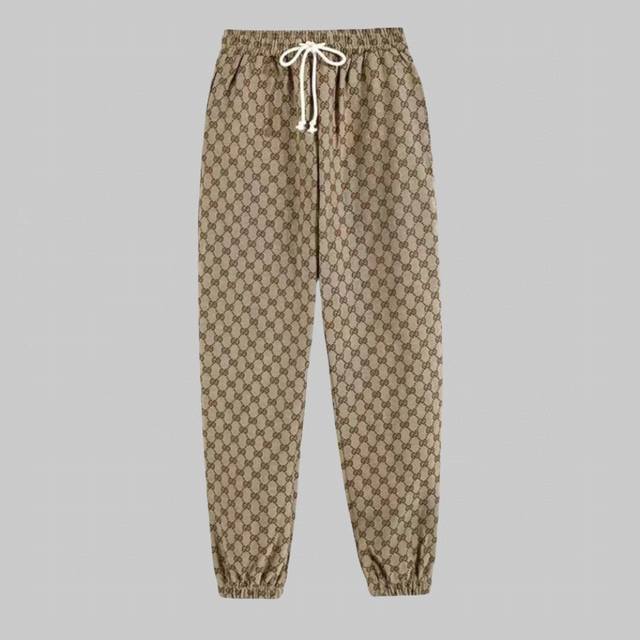 高品质 the North Face Gucci 刺绣满幅经典双G松紧抽绳哈伦束脚休闲裤 醒目的标志性满幅提花双G图案 高腰抽绳松紧 下脚摆做了一个束脚 裤型能