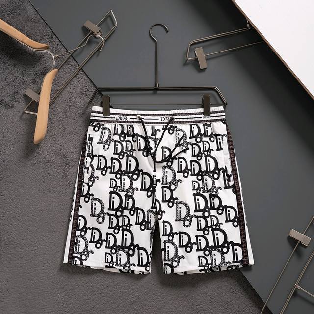dior 迪奥 2025春夏季新款休闲高品质 速干裤梭织面料 沙滩裤 超高端品质3D数码印花工艺制作而成 原版复刻 整体提花最新字母联盟Logo图案设计 纤维面