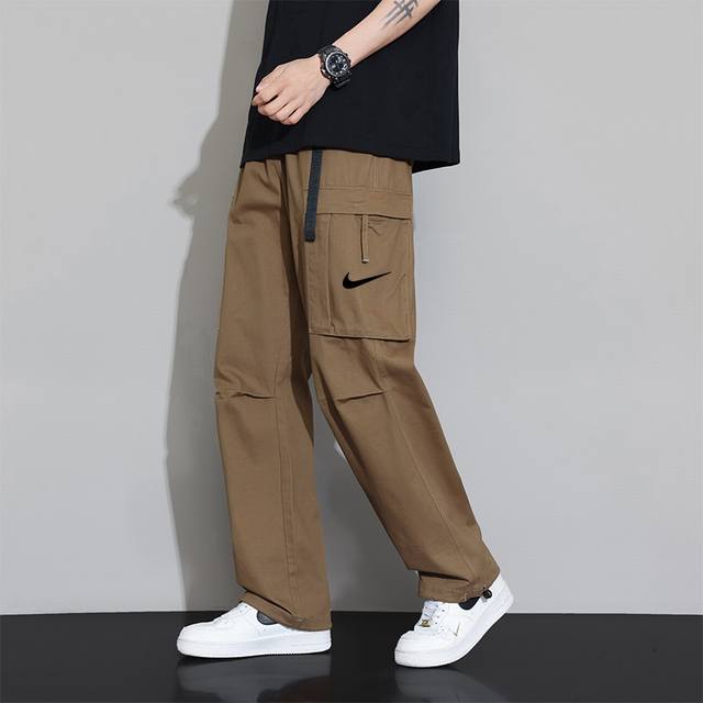 秋夏季新款耐克Nike单勾印花大口袋工装休闲长裤束脚卫裤 耐克Logo完美呈现经典 纯棉材质 质感特赞 ， 上身舒适有型 超级百搭得一款裤子 喜欢户外旅行 工装