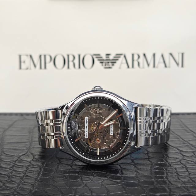 Emporio Armani阿玛尼飞轮镂空全自动机械手表Ar60003 阿玛尼手表以让男性时尚、儒雅、气度非凡为目标，追求时尚大气的商务风格的同时一并展现生活中