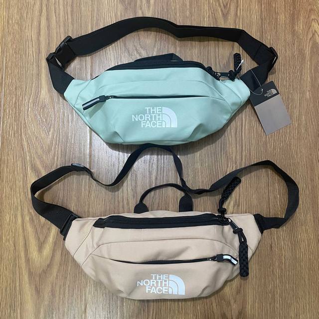 The North Face Tnf北面反光条单肩包多功能运动休闲腰包胸包手提包斜挎包包 材质：帆布 肩带：110Cm 可调节 颜色：绿色 卡其色 尺寸：33X