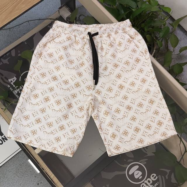 上新 款号：Jxk60 2025新款Louis Vuitton路易威登扎Lv涂鸦满印满印Logo图案印花休闲情侣沙滩速干五分短裤，采用爽滑面料，体感更舒服，定位