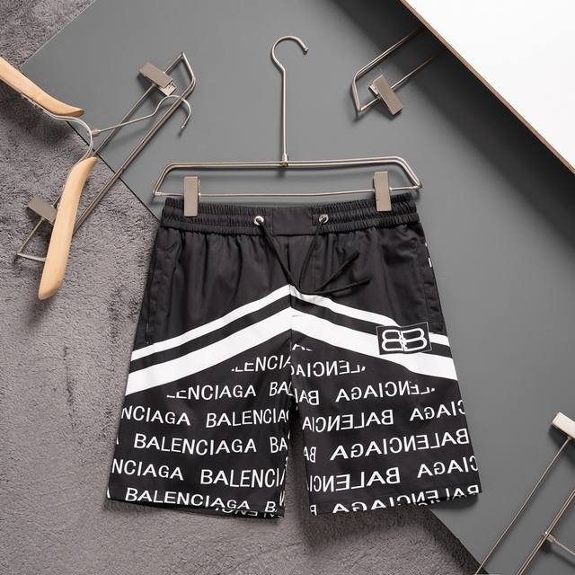 Balenciaga巴黎世家 夏季新款沙滩裤 经典印花速干五分裤，男女同款，面料为客供聚酯纤维材质 耐脏抗皱 最适合夏天出去游玩的料子 保证凉爽的同时又足够的舒