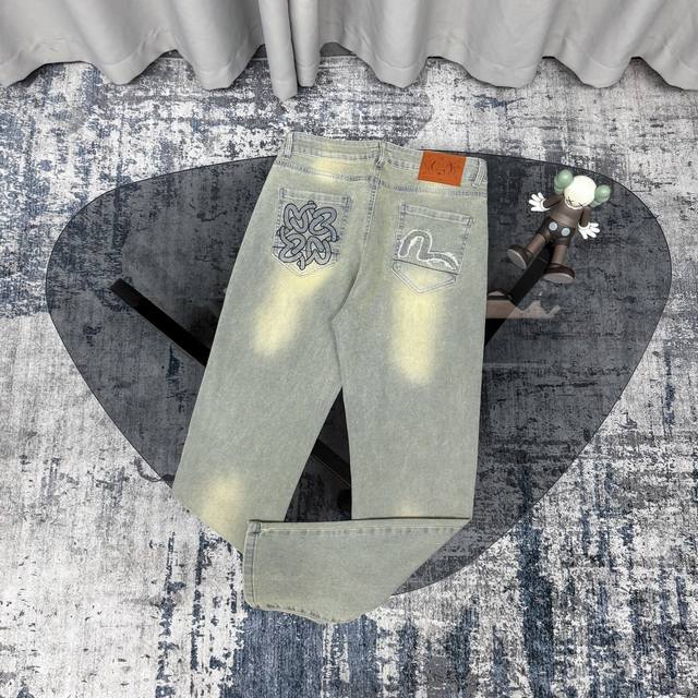 Evisu脏脏做旧牛仔长裤Evisu 福神牛仔裤 情侣款特供中山原厂原浆牛仔，面料环保，做旧拼接元素，和带有欧美风格的腰果花组合，与M的完美结合、个性十足做工精