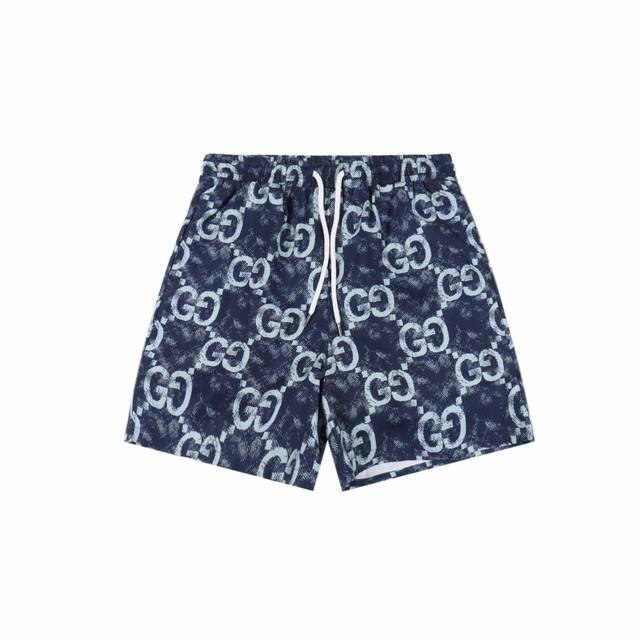 Gucci 古驰 25Ss 双G满印扎染沙滩短裤 25Ss新款夏季沙滩旅游必备！精选优质聚酯纤维面料，面料舒适有弹性的同时版型修身速干，定点满印古驰Logo工艺