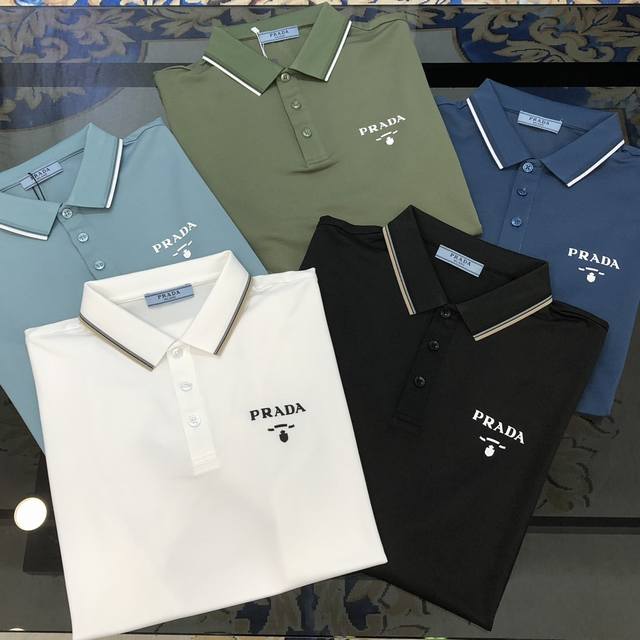 P*Ada 普拉哒2025春夏新款原单男士翻领Polo衫短袖T恤 高端定制 简洁时尚百搭爆款胸前印胶字母Logo图案设计 定制进口桑蚕丝珠地棉混纺面料 穿着舒适