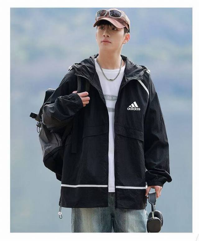 供 Adidas阿迪达斯爆款防晒连帽防晒衣外套 男女同款 穿在身上没有感觉，好像和身体融为一体，超轻薄透气，防晒衣的主要作用是防治太阳紫外线的直接照射，作用和遮