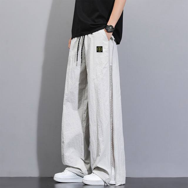 Stone Island 石头岛裤子海外专柜冲锋机能休闲裤 男女同款 侧面拉链，防水冲锋裤，小红书主播推荐，上身质感满满，版型立体，完美修饰腿型，可随意日常搭配