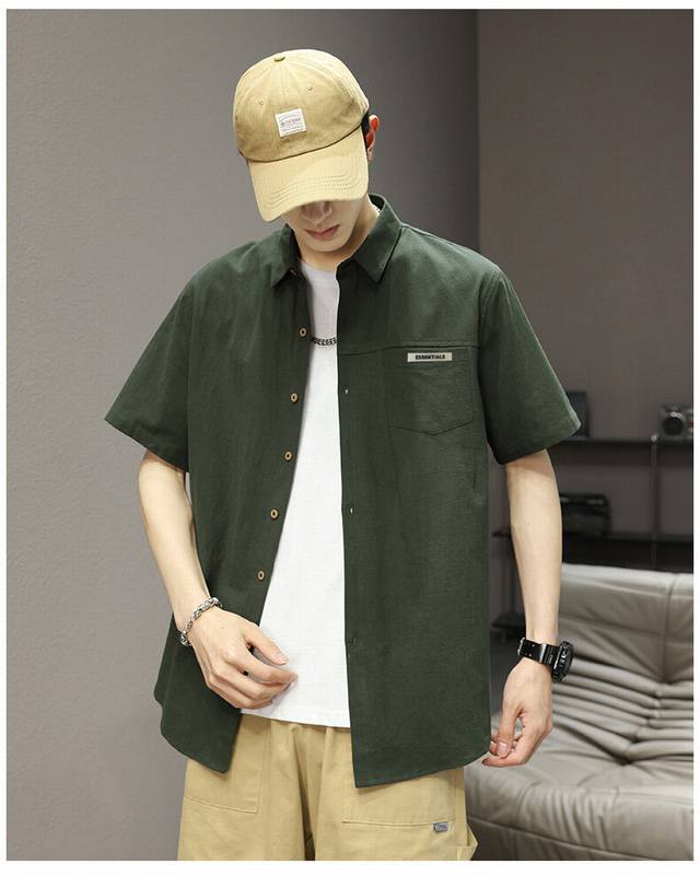 Ess25Ss新款四色高品质休闲纯棉短袖衬衣！ 衣服版型宽松 细节完美 采用梭织面料耐磨耐脏 立体裁剪宽松版型 进口皮标反复水洗不会开裂脱落，男女同款情侣款 颜