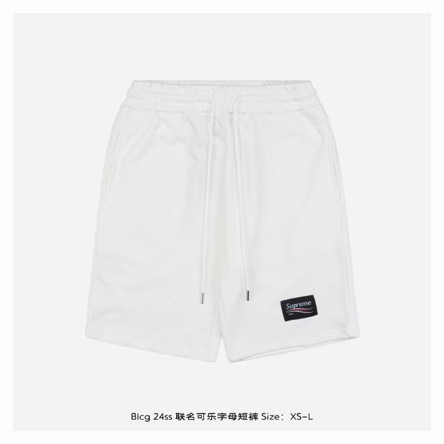 Balenciaga 巴黎世家 24Ss 联名可乐字母短裤 面料采用380克重精梳棉，两遍水洗处理，面料舒适亲肤无异感，定制定染面料，纺织密度高，垂感佳，不易变