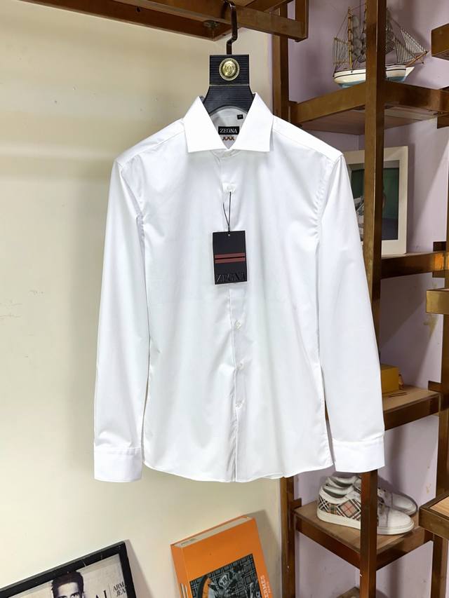 Zegna 杰尼亚 顶级商务原单长袖衬衫高级定制百搭款式 任何人都可以轻松驾驭 面料全订制工艺 胸前奢华经典品牌最新Logo设计，非常显档次懂货的必须入！版型剪