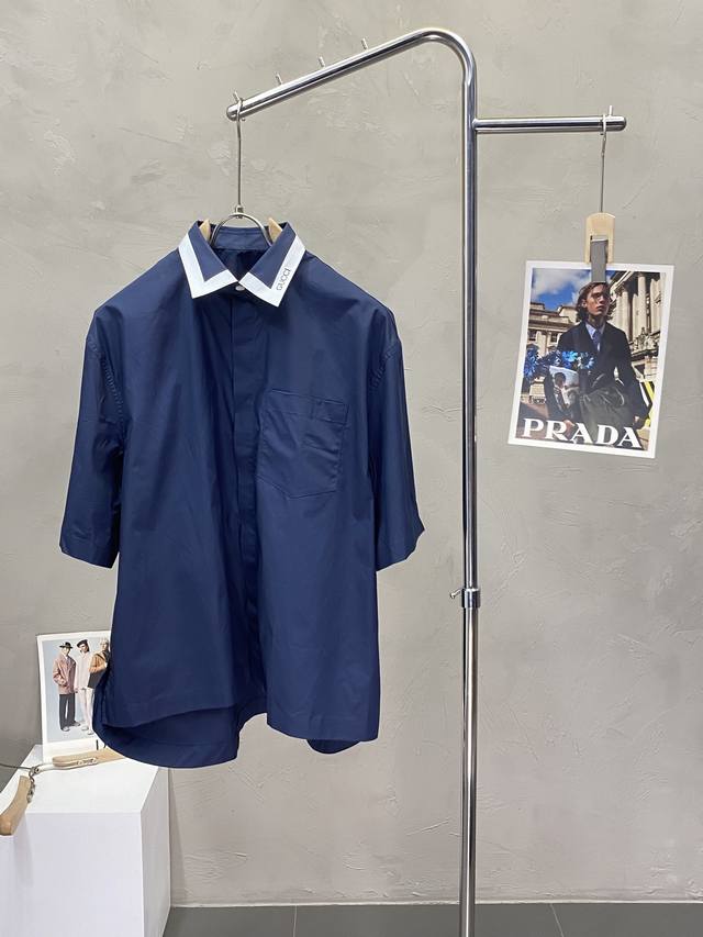 Gucci古驰独家专供新品时尚休闲短袖衬衫 进口原版面料，柔软舒适，上身舒适透气，独特设计风格，无论是单穿还是搭配，都是百搭单品，彰显了年轻人的个性，原版辅料，