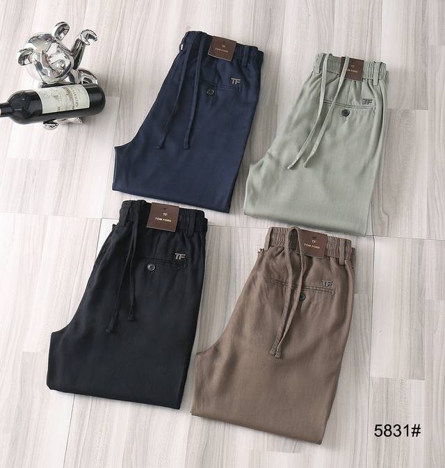Lp2570春夏爆款 款号：5831 颜色：黑色，蓝色，咖啡色，豆绿色 尺码：29-40 介绍：高端松紧腰裤 顶级设计 高品质五金辅料与工艺，进口面料 弹力舒适