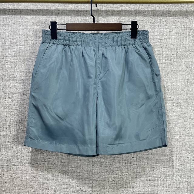 Lv 2025 Ss春夏新款 丝质提花休闲短裤 浅绿色暗纹丝质面料 满身棋盘效果提花 点缀品牌Logo图案 弹力松紧带腰围 尺码：S M L Xl