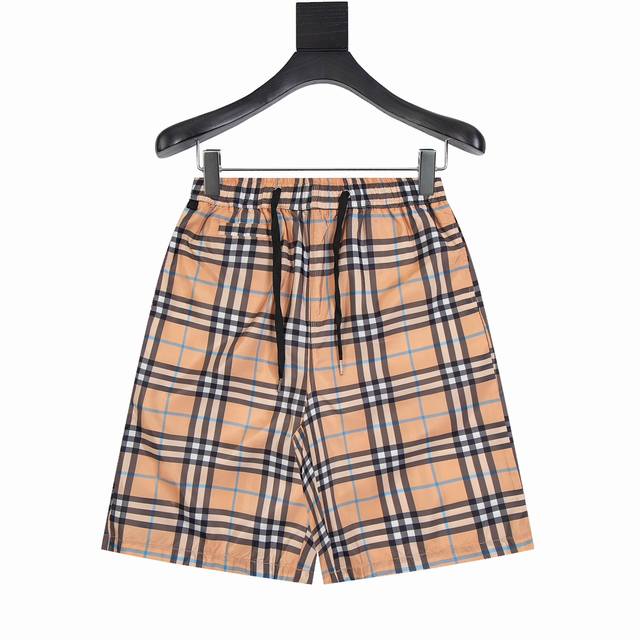 Burberry 巴宝莉 条纹格子沙滩短裤 夏季渠道限定沙滩短裤，定制条纹面料作为整条裤子的点睛之笔，更具个性高级，宽松的阔腿裤版型，上身秒变大长腿，手感柔软细